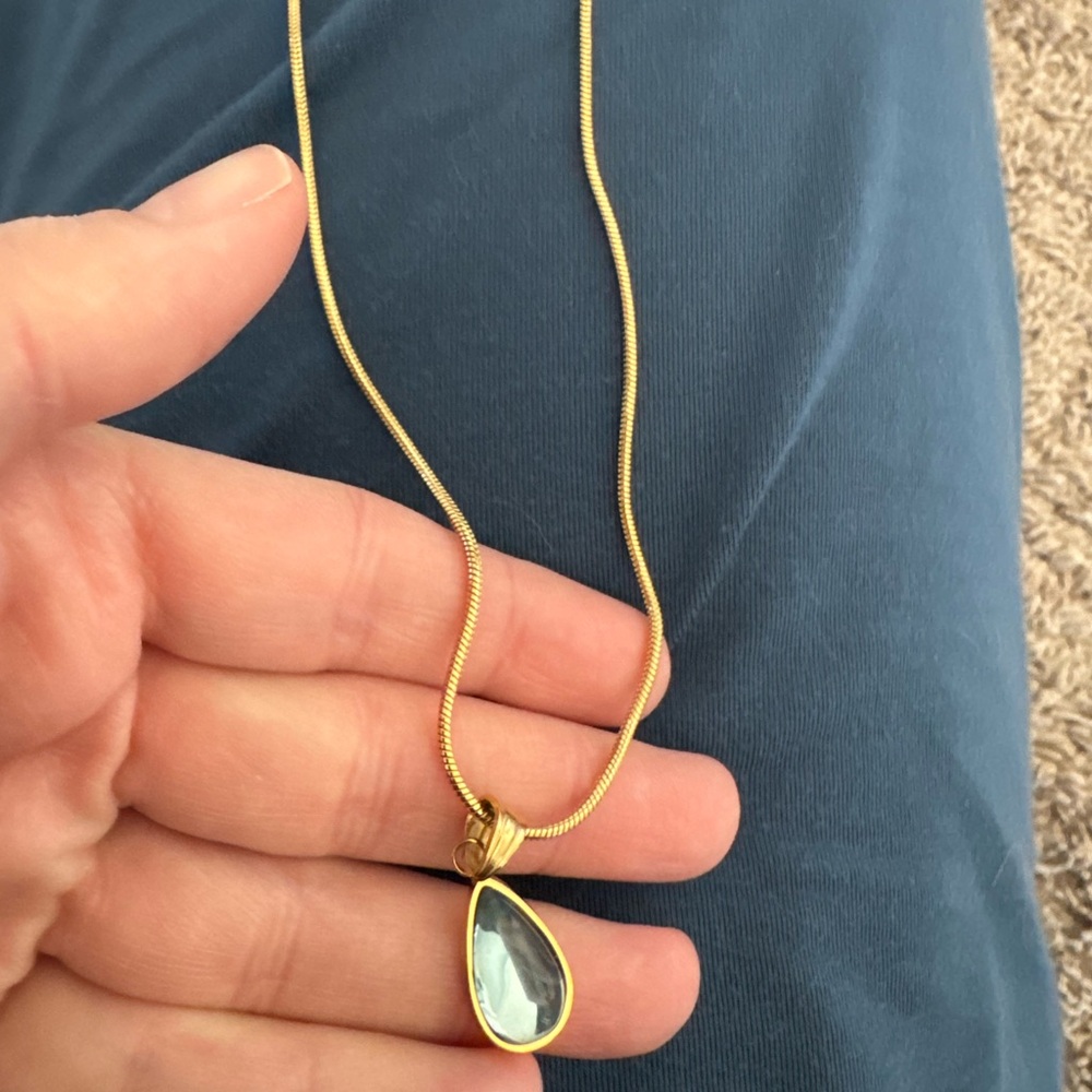 Elegant Gold Necklace with Blue Pendant